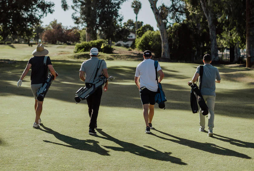 men golfing