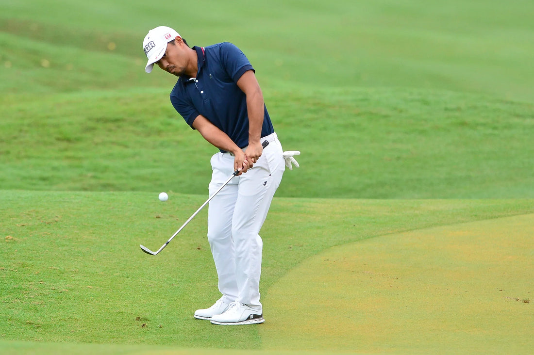 chipping golfer