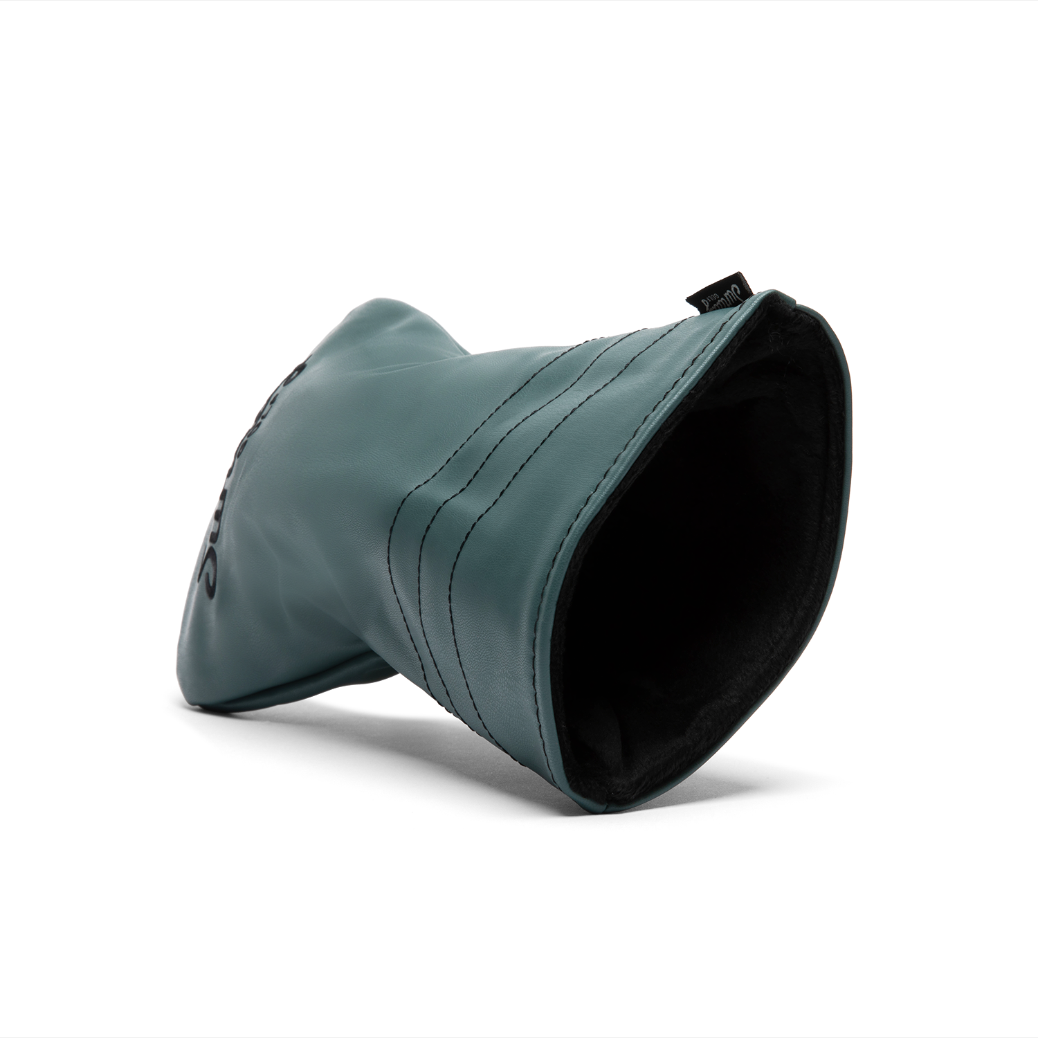 Inward shot of driver golf headcover in midnight green vegan leather