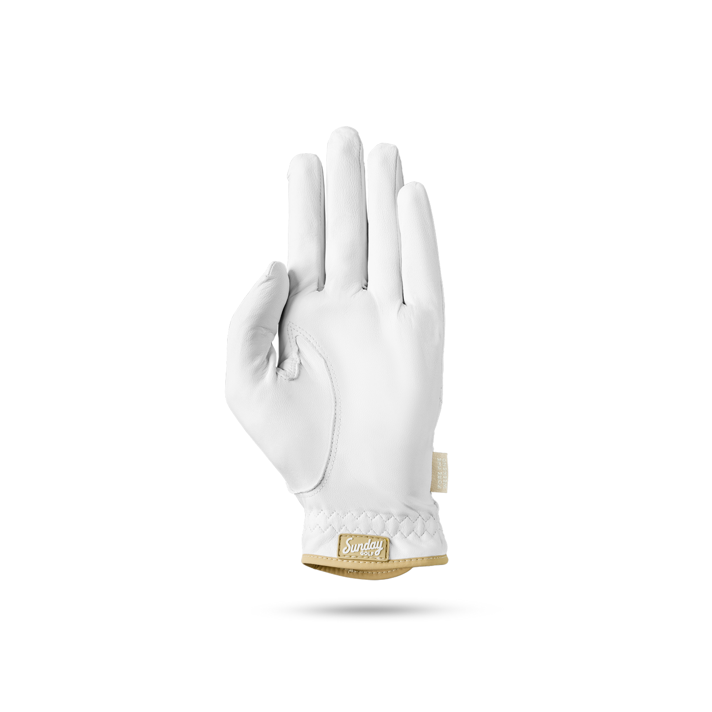 The front of leather golf glove in toasted almond and white color showing the Sunday Golf logo at its seams