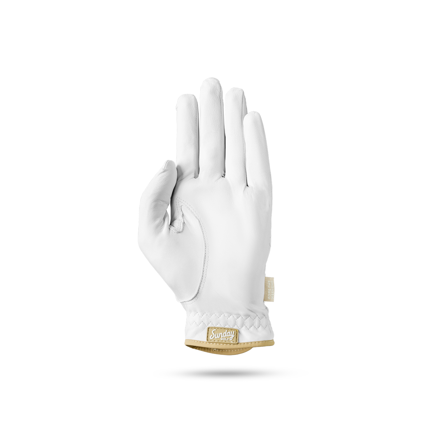 The front of leather golf glove in toasted almond and white color showing the Sunday Golf logo at its seams