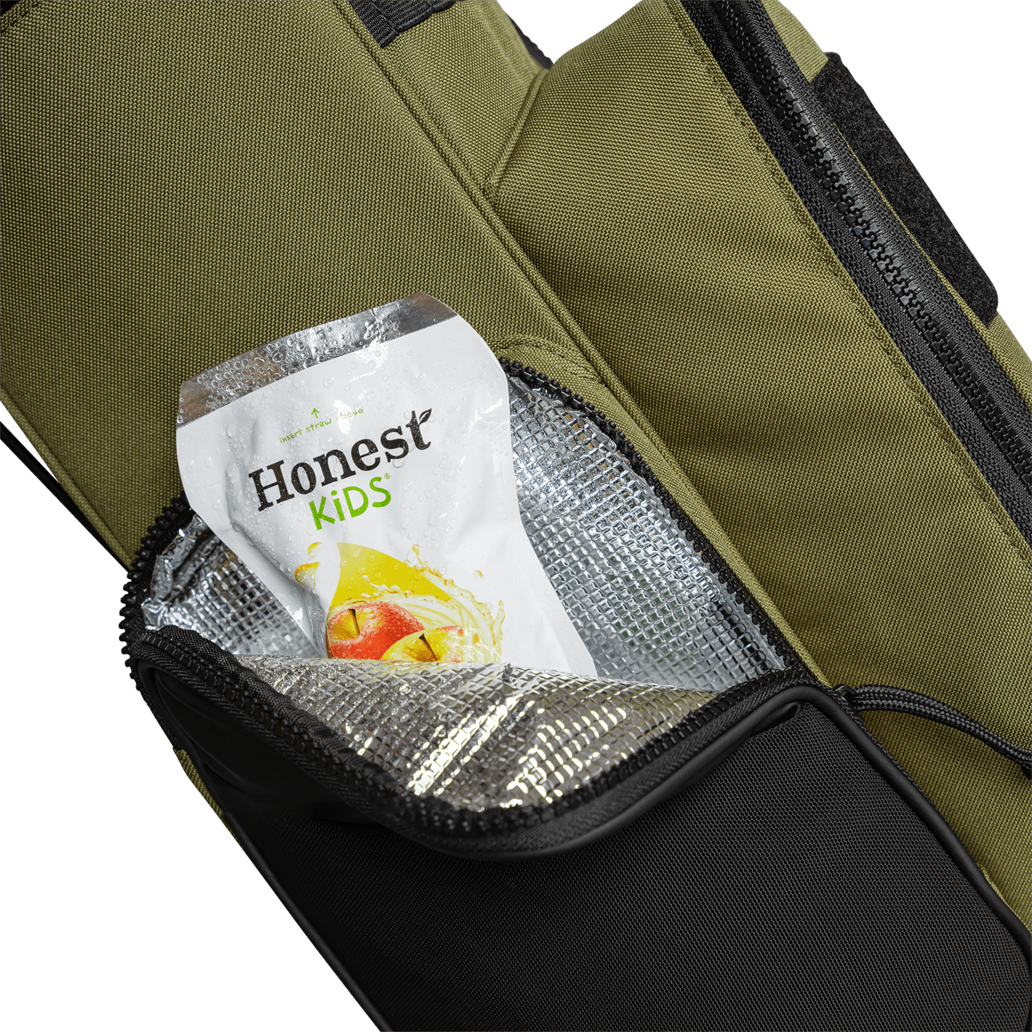 A close up shot of a Patton Green Recess kids golf bag's insulated pocket with a canned drink inside