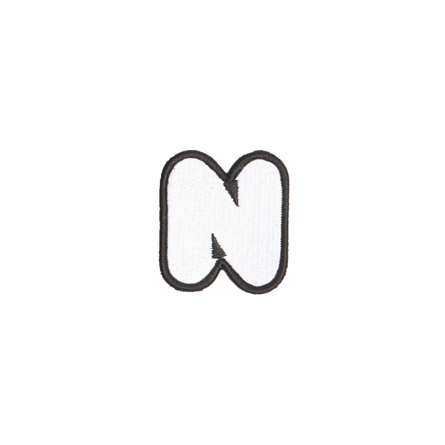 A white embroidered letter 'N' patch with a black border