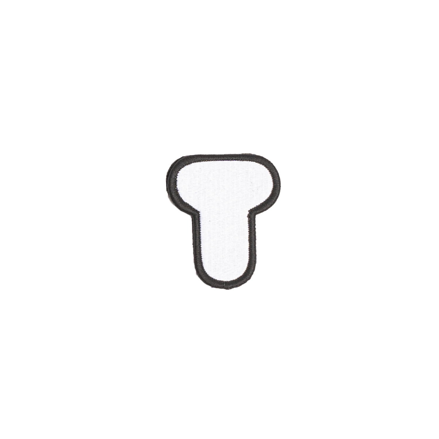 A white embroidered letter 'T' patch with a black border