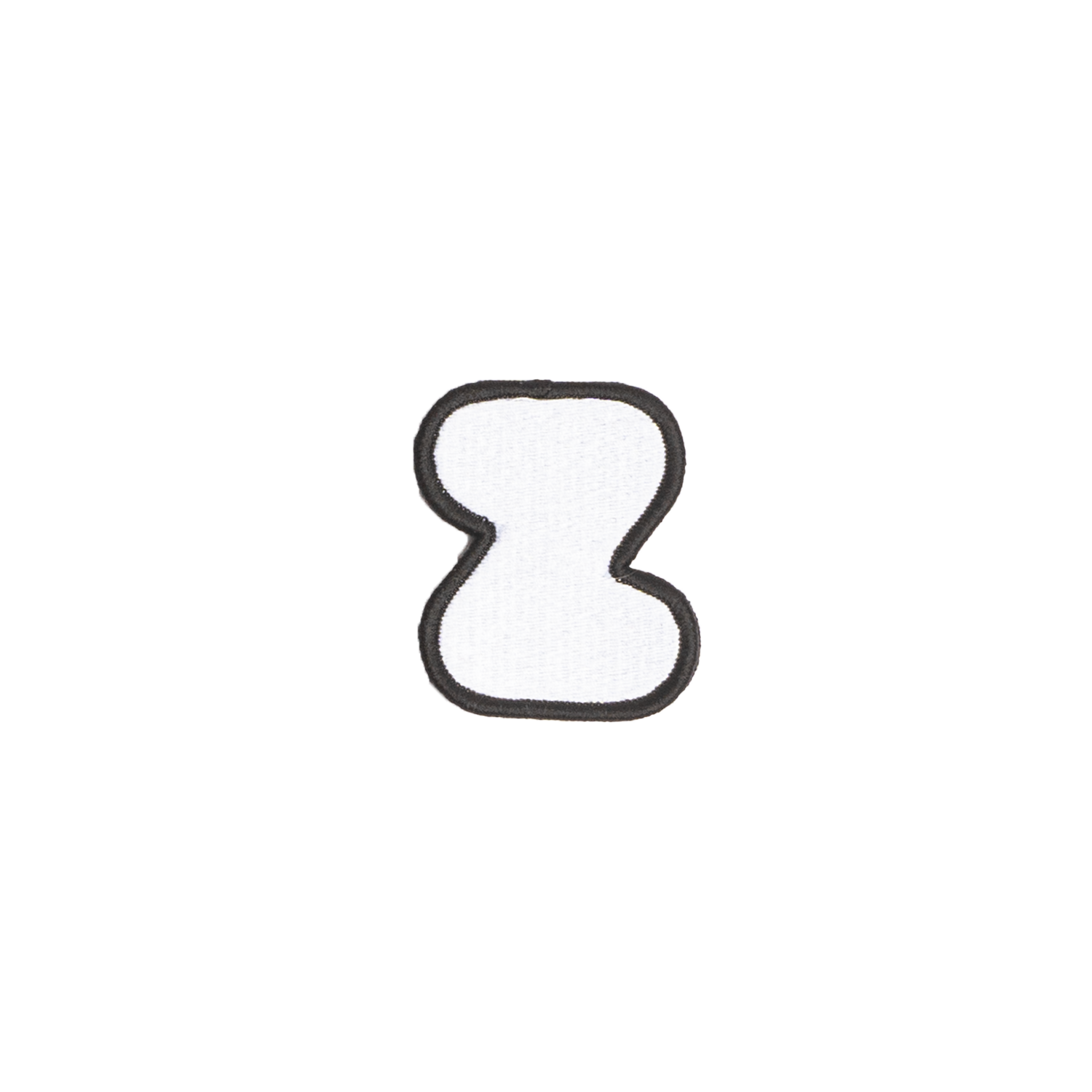 A white embroidered letter 'Z' patch with a black border