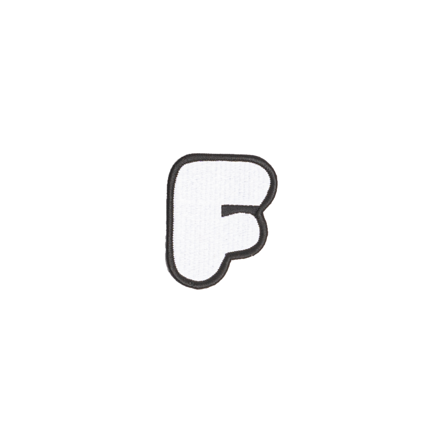 A white embroidered letter 'F' patch with a black border