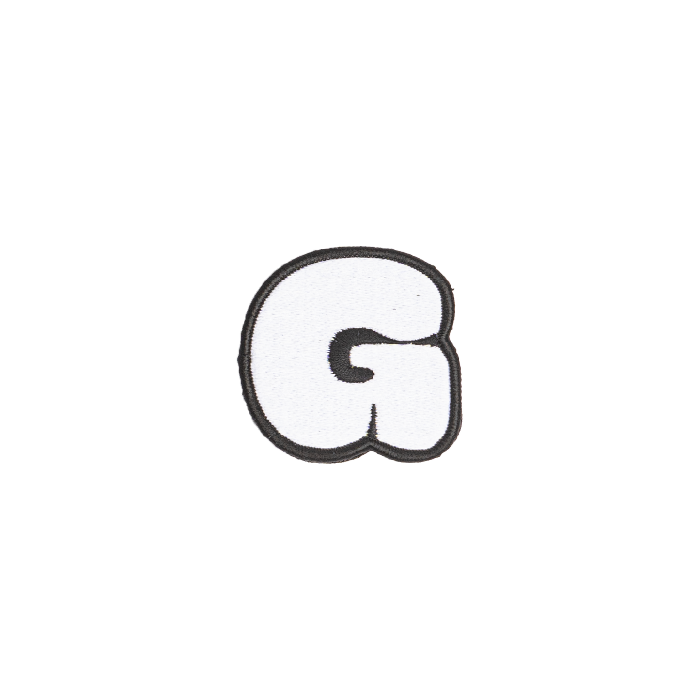 A white embroidered letter 'G' patch with a black border