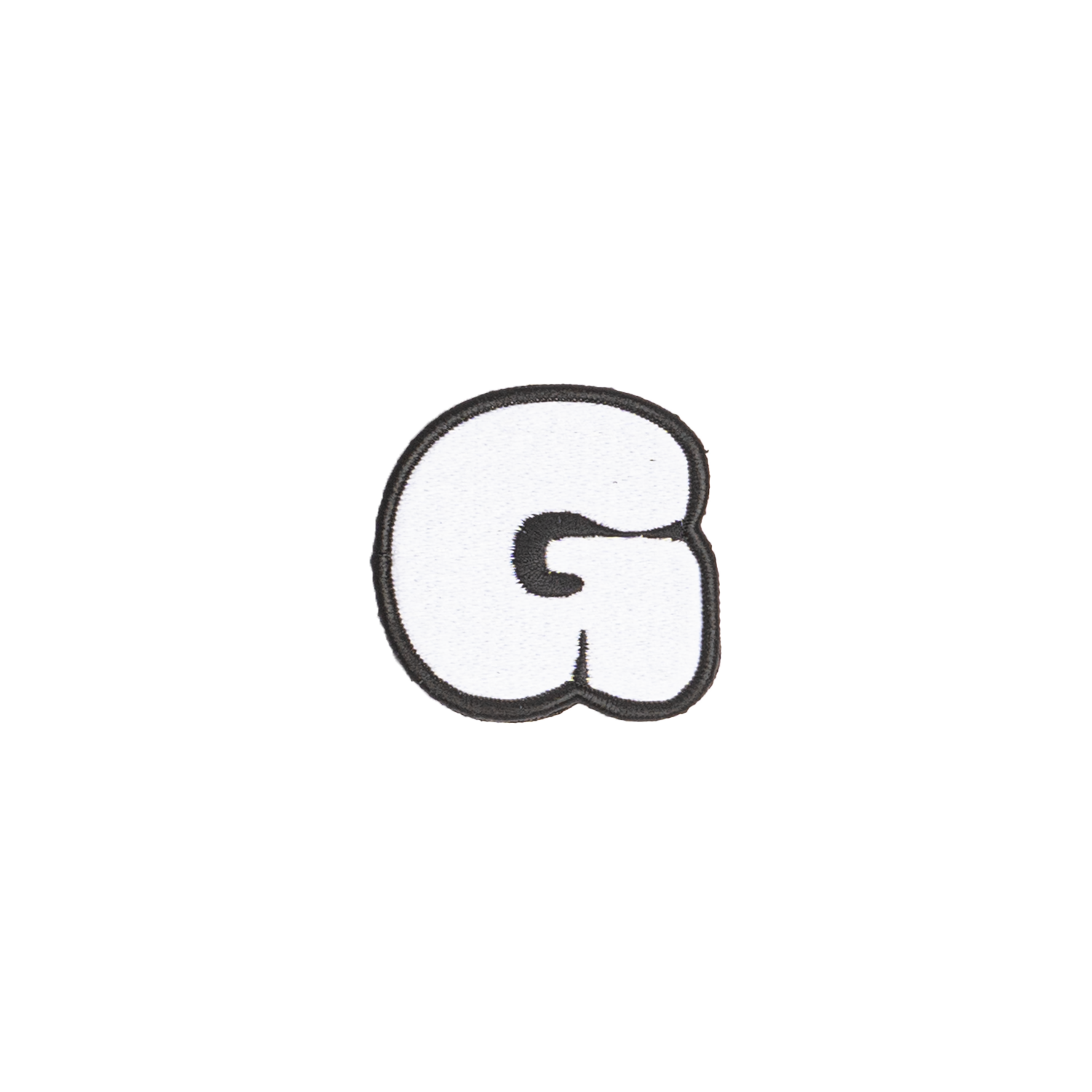 A white embroidered letter 'G' patch with a black border