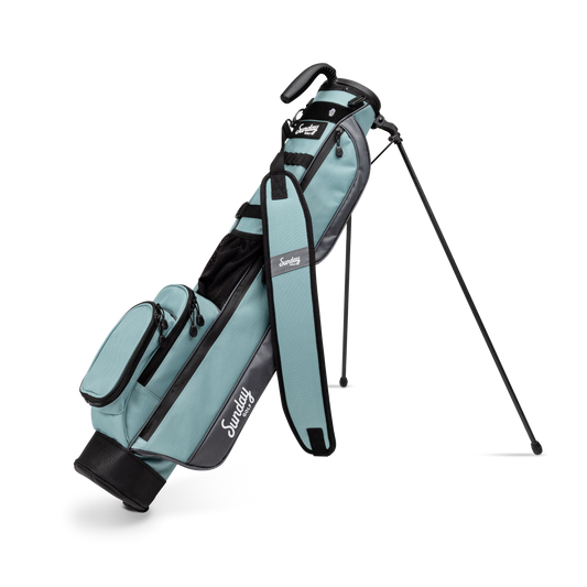 A full front shot of standing Loma golf bag in seafoam with single strap