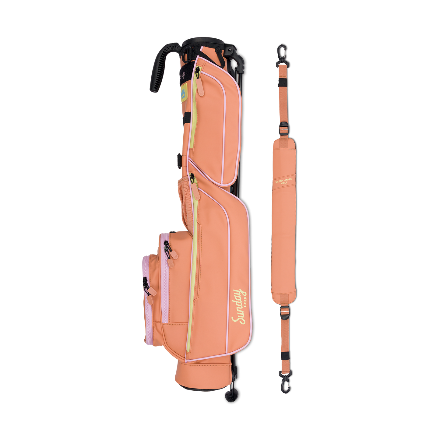A full shot of Loma golf bag in sierra madre laying flat sideways beside its single strap