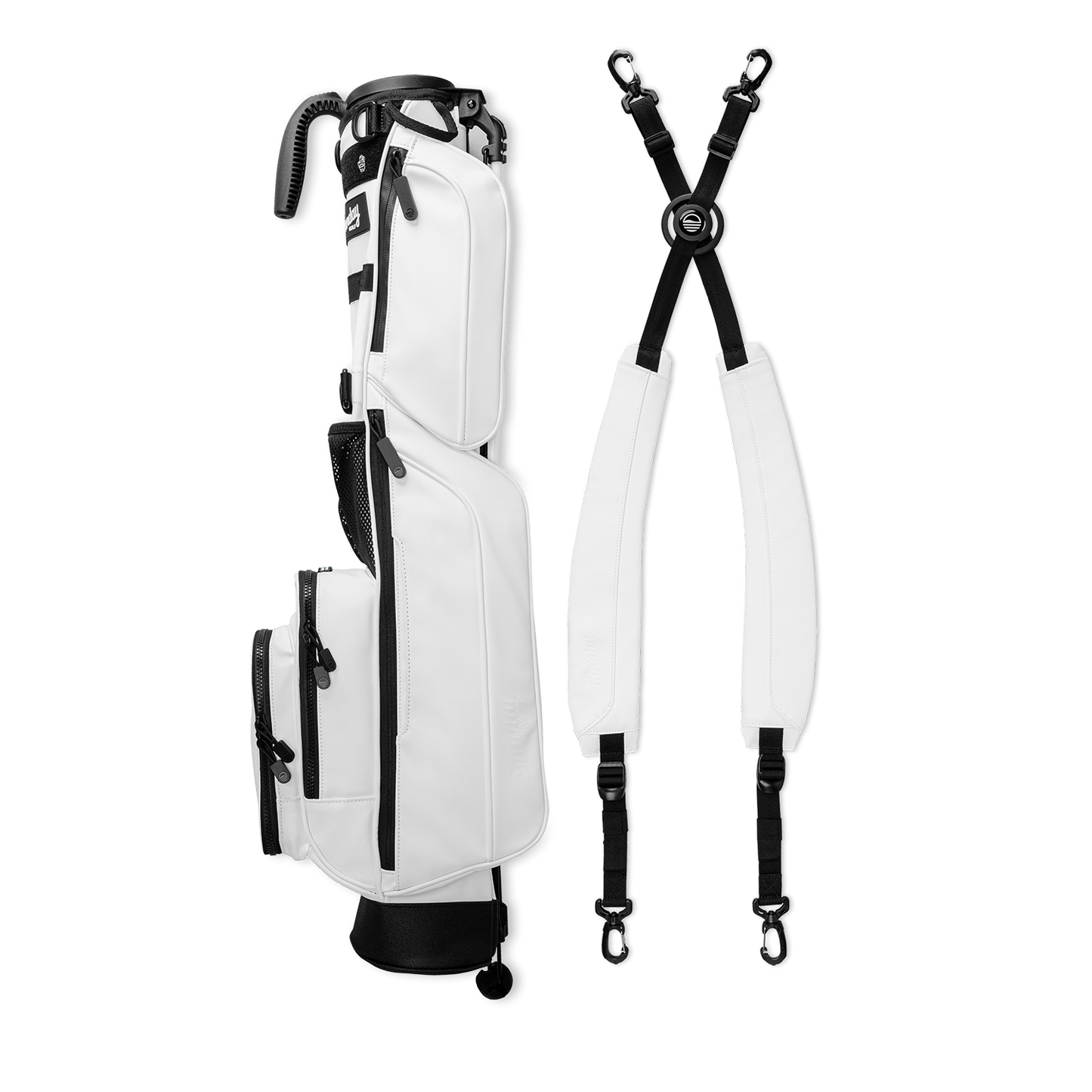 A full shot of Loma XL S-Class golf bag in white vegan leather laying flat sideways beside its double strap