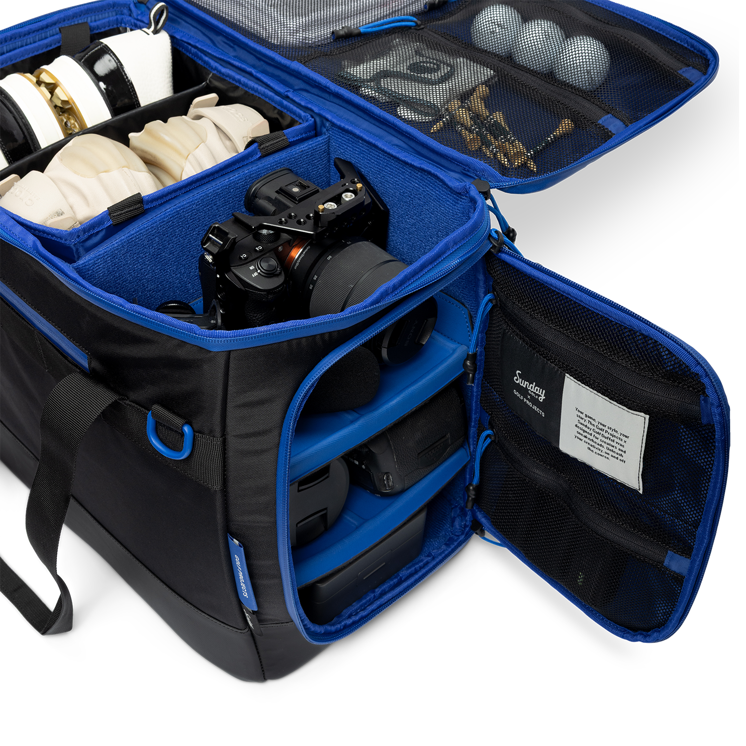 Sunday Golf's Creator Duffle Bag showcasing compartments containing camera equipment, accessories, and golf balls.