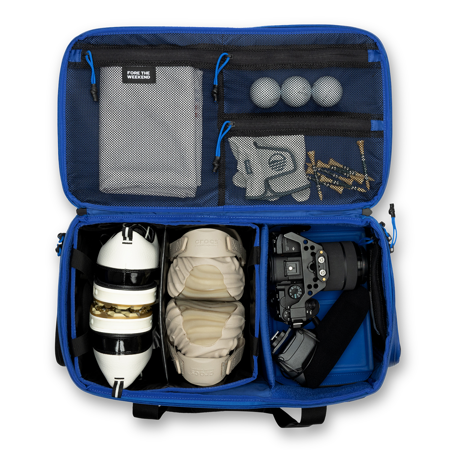 Sunday Golf's Creator Duffle Bag Blue showcasing compartments containing sports equipment
