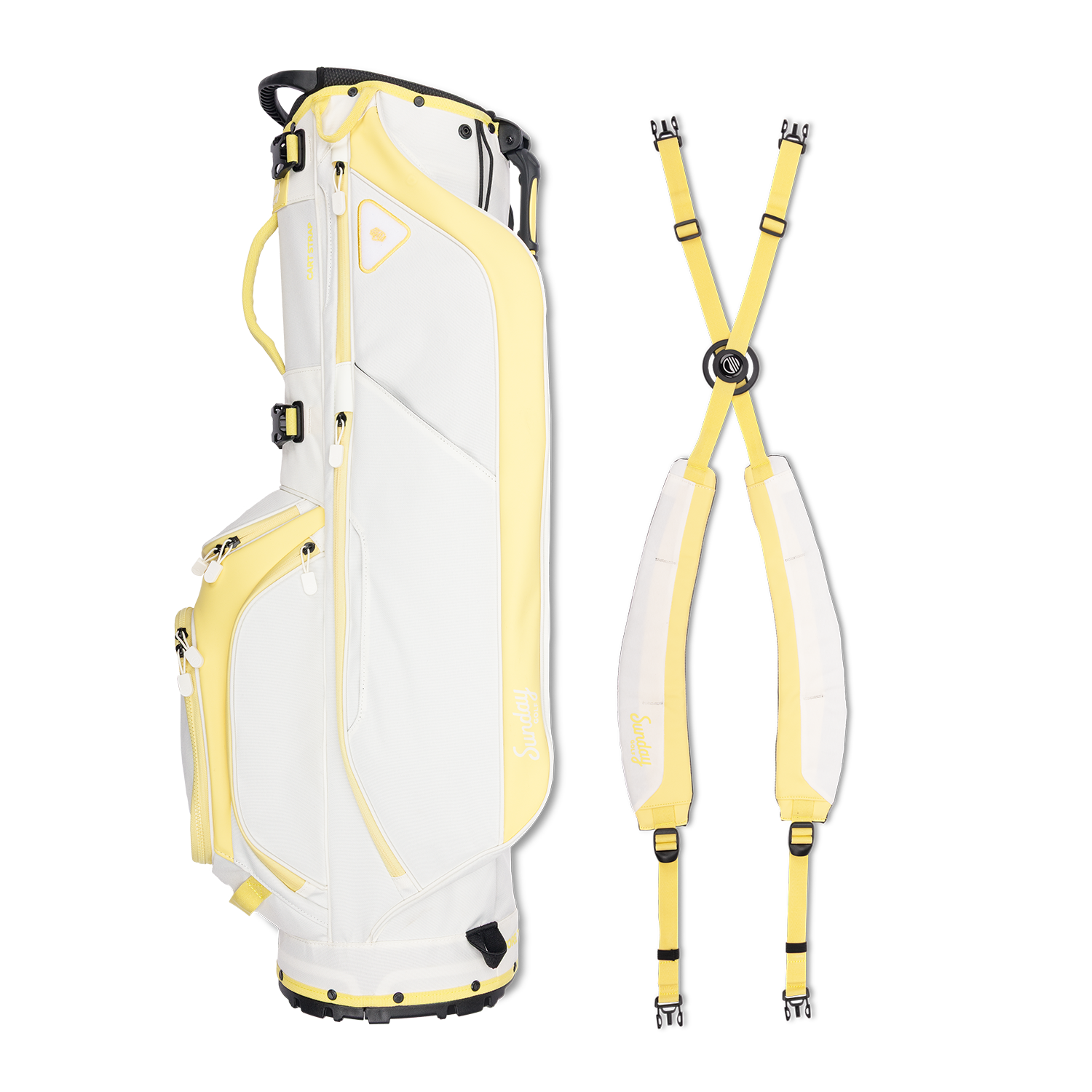 A full shot of Ryder golf bag in mindy lemon laying flat sideways beside its double strap