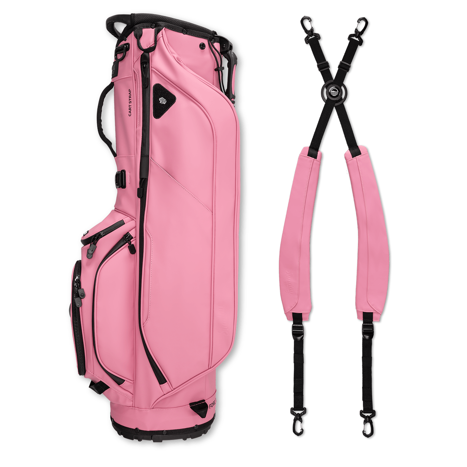 A full shot of Ryder S-Class golf bag in dusty pink vegan leather laying flat sideways beside its double strap