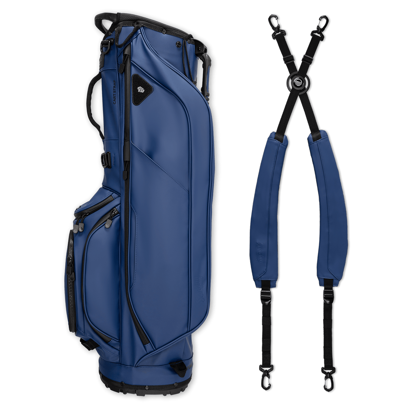 A full shot of Ryder S-Class golf bag in navy vegan leather laying flat sideways beside its double strap