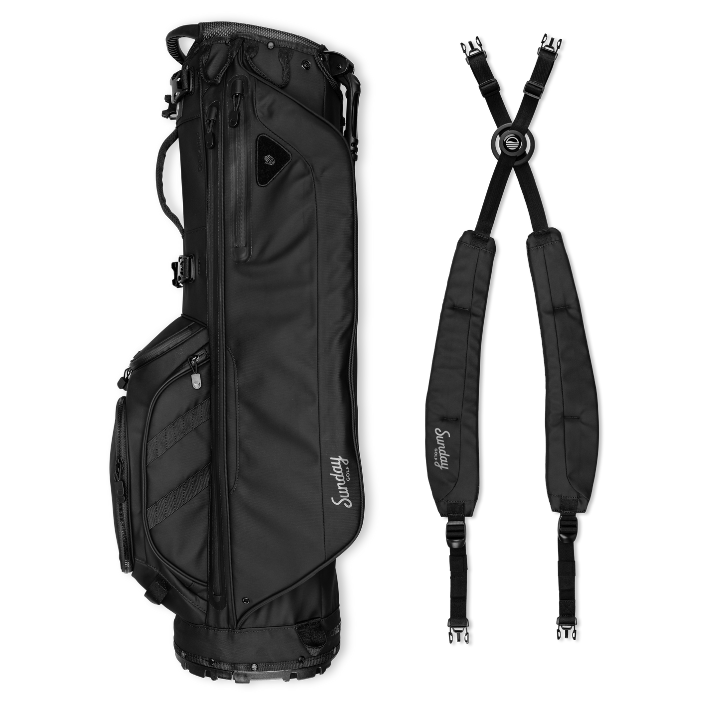 A full shot of Storm Ryder golf bag laying flat sideways beside its double strap