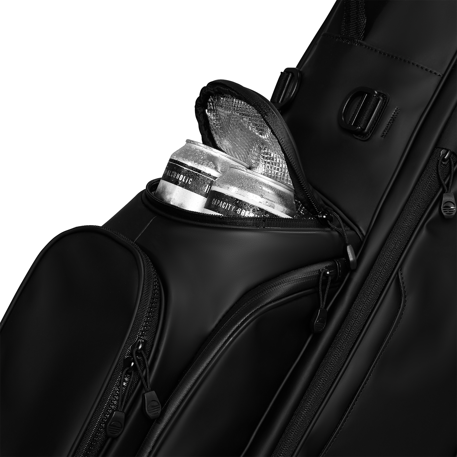 A close up shot of black vegan leather Ryder S-Class golf bag's frosty pocket with canned drinks inside