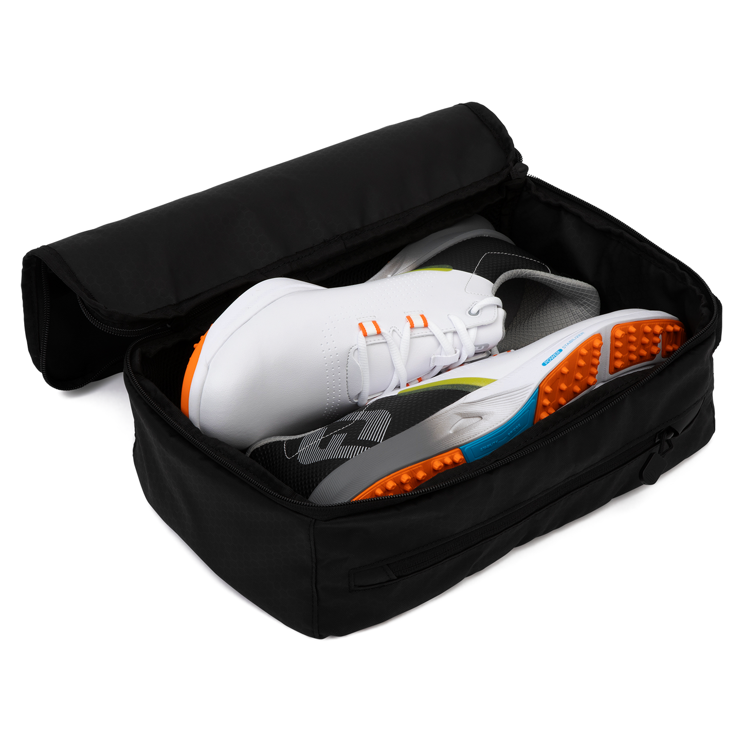 A pair of rubber shoes inside a golf shoe travel bag