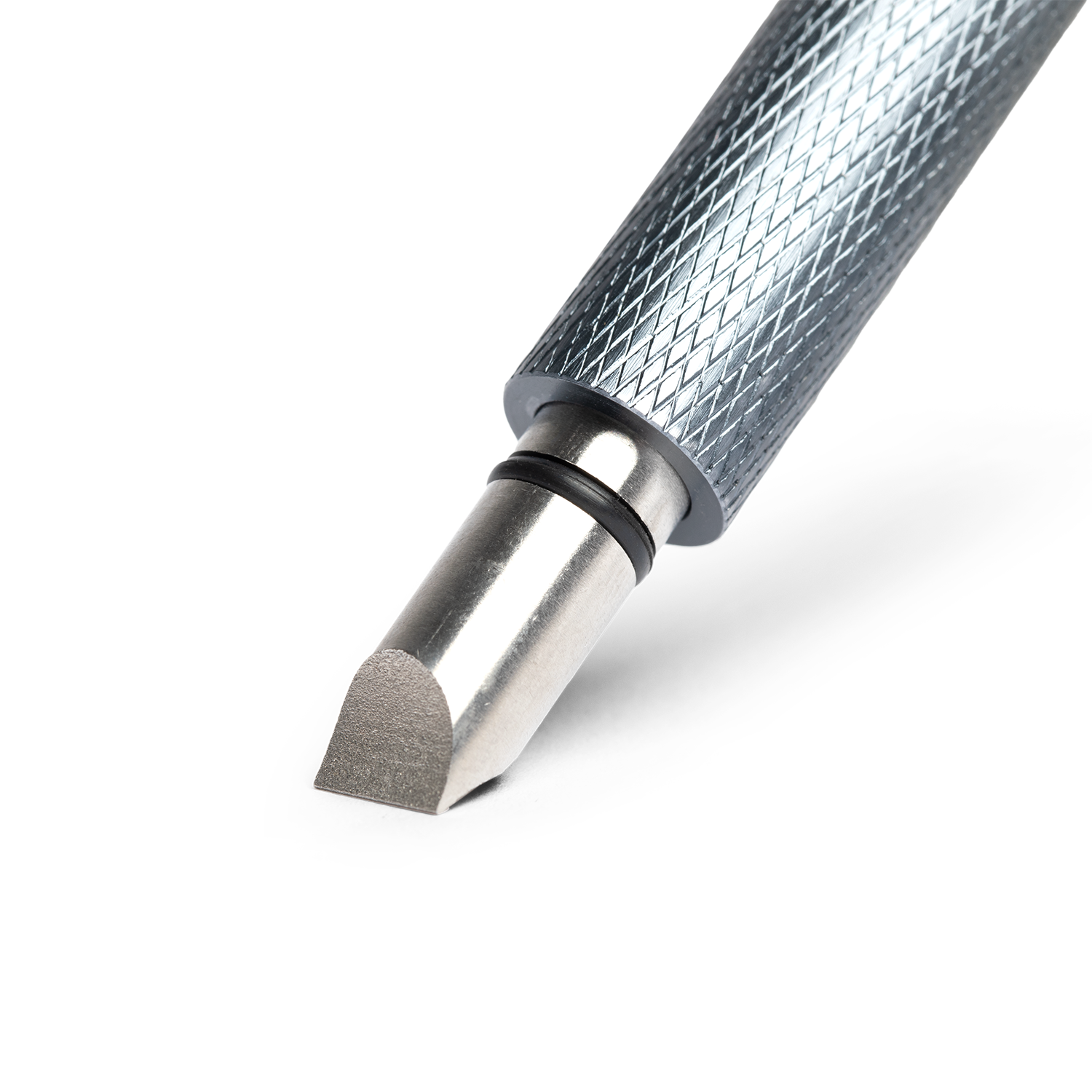 close up shot of golf club groove sharpener in black showing its sharp edges