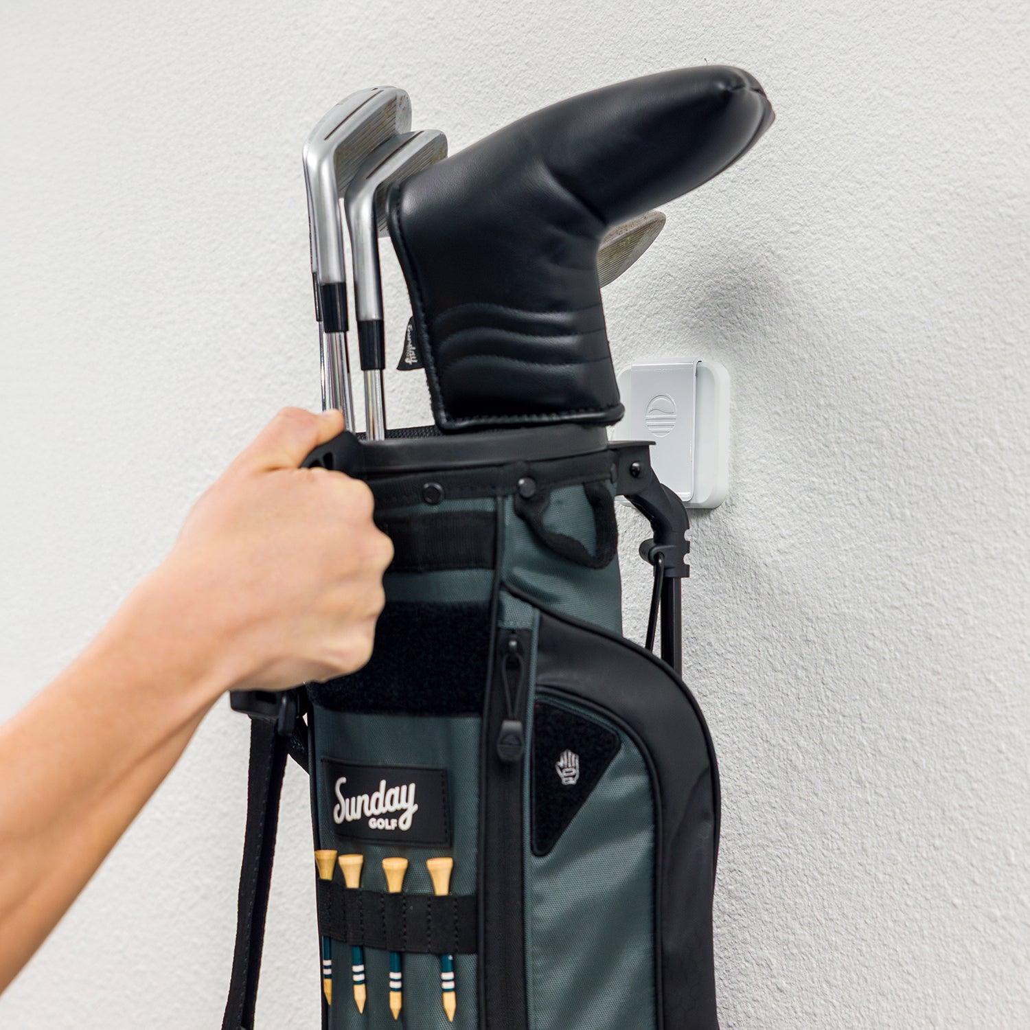 White Loma Wall Hook video showing how it is being used. Mounted on the wall with a bag.