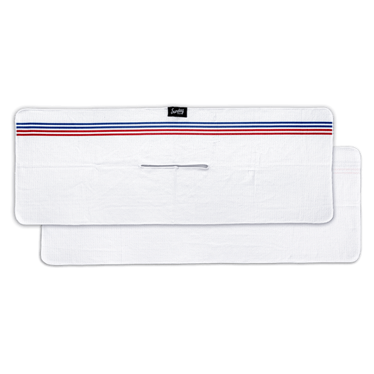 white El Classico golf towel by Sunday Golf with red and blue pinstripe across top horizontal