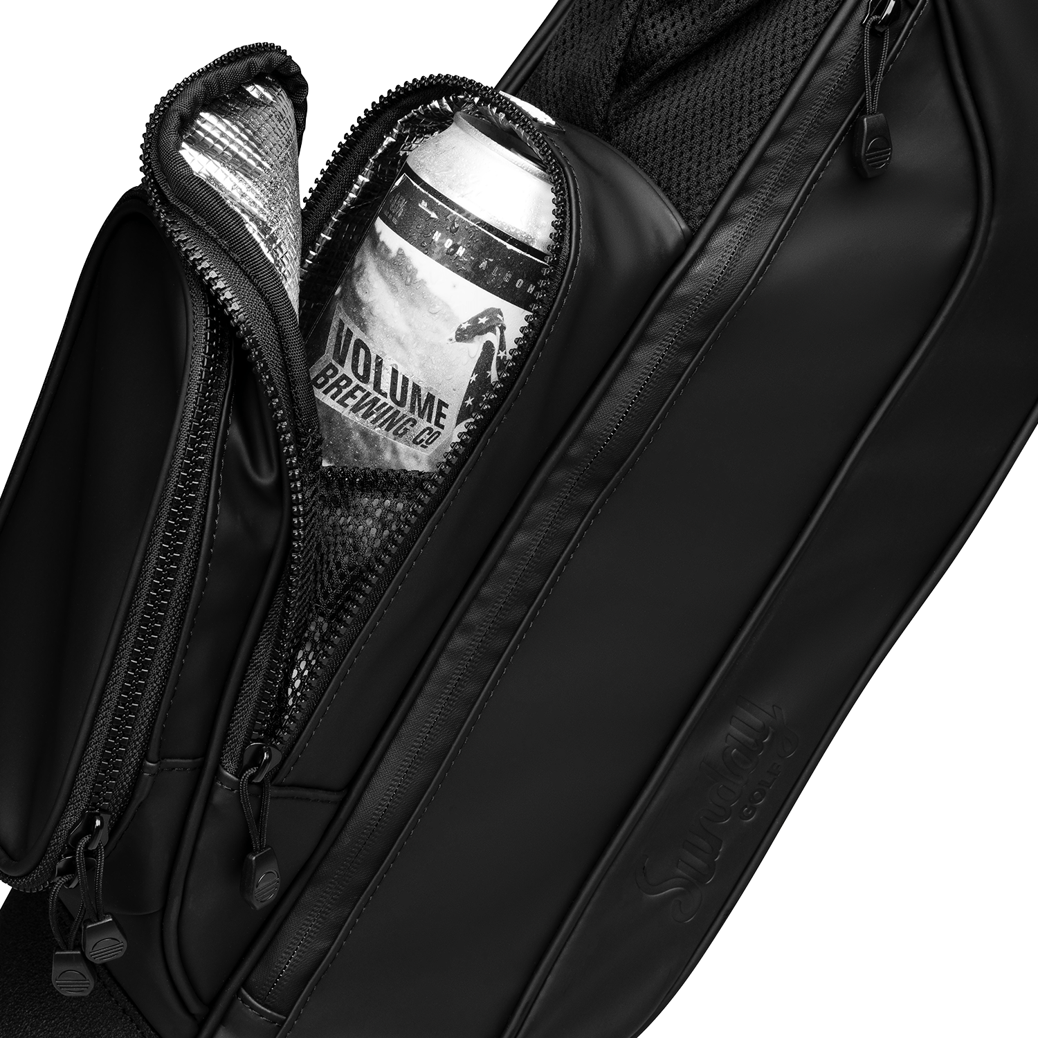 A close up shot of black vegan leather Loma S-Class golf bag's frosty pocket with a canned drink inside