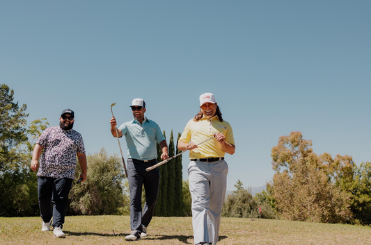 golf players in golf course holding their golf clubs