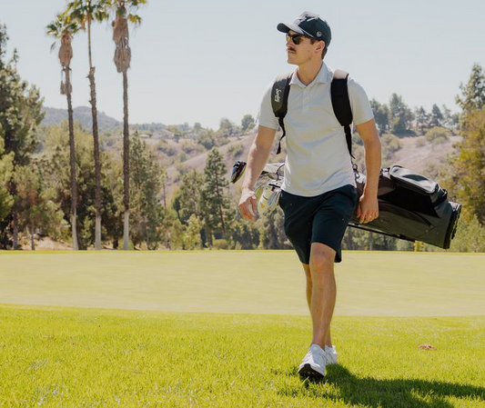 how to carry a golf bag properly