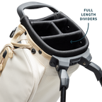 A close up top view of a toasted almond El Camino golf bag's 4 way divider along with product description labels