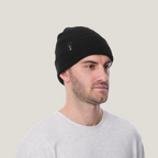 man wearing the black mickey beanie