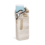 A front shot of big frosty golf cooler bag in toasted almond unzipped showing an icepack and canned drinks inside
