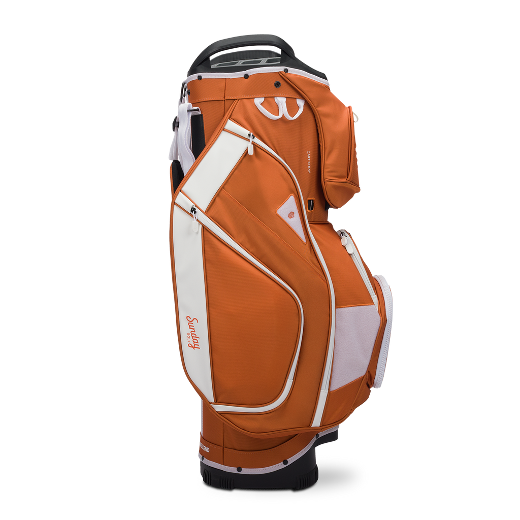 Side shot of Big Rig golf bag in burnt orange showing the glove holder, easy access pockets and other features of the bag