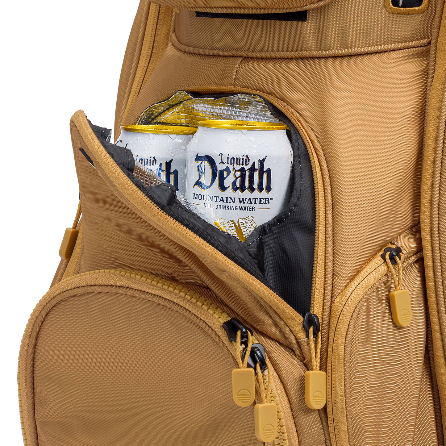 A close up shot of clay thompson Big Rig golf bag's frosty pocket with canned drinks inside
