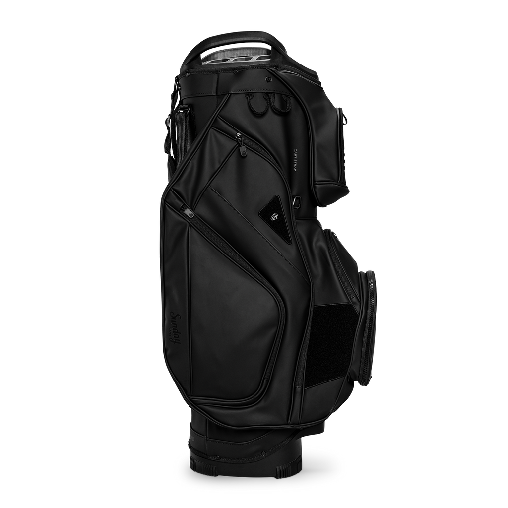 Side shot of Big Rig S-Class golf bag in black vegan leather showing the glove holder, easy access pockets and other features of the bag