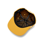Upside down shot of mustard crushable rope golf hat