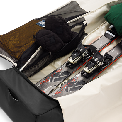 Open Drifter Snow Travel Bag with skis and gear inside