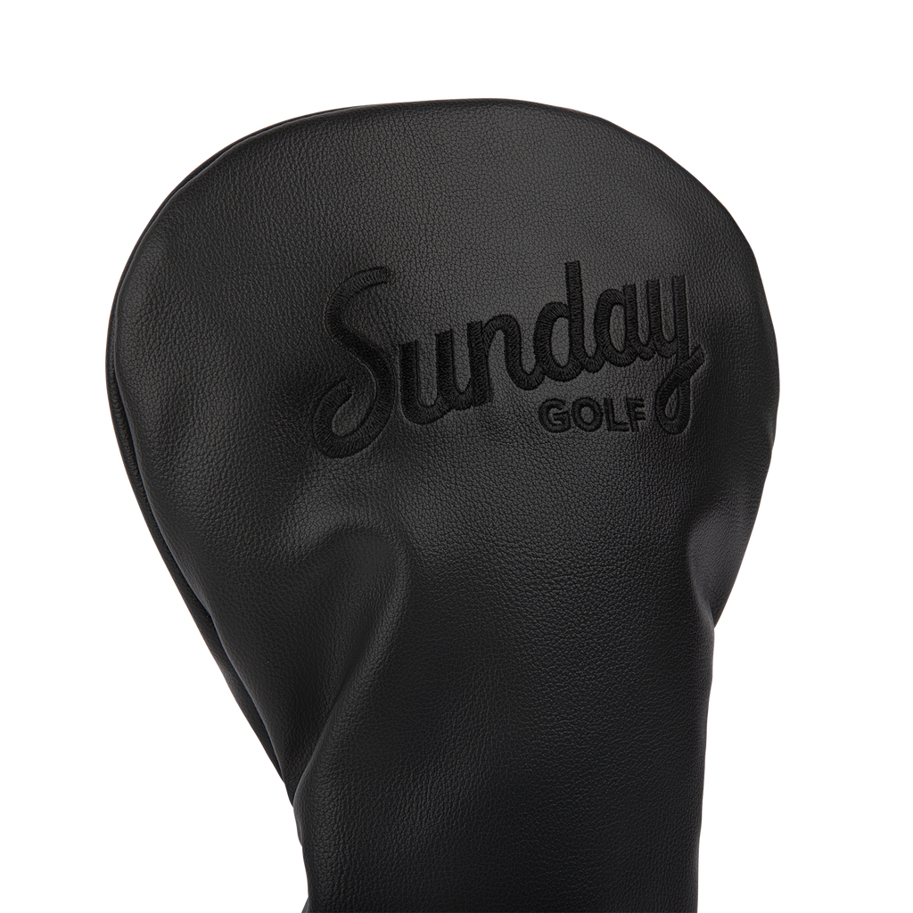 Close up shot of driver golf headcover in black vegan leather showing its material and Sunday Golf logo
