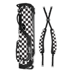 A full shot of El Camino golf bag in Black/White Checker laying flat sideways beside its double strap 
