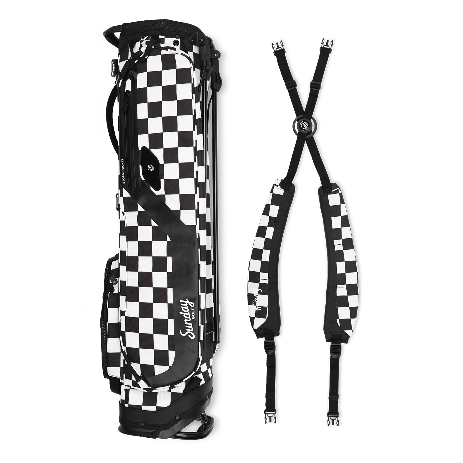 A full shot of El Camino golf bag in Black/White Checker laying flat sideways beside its double strap 
