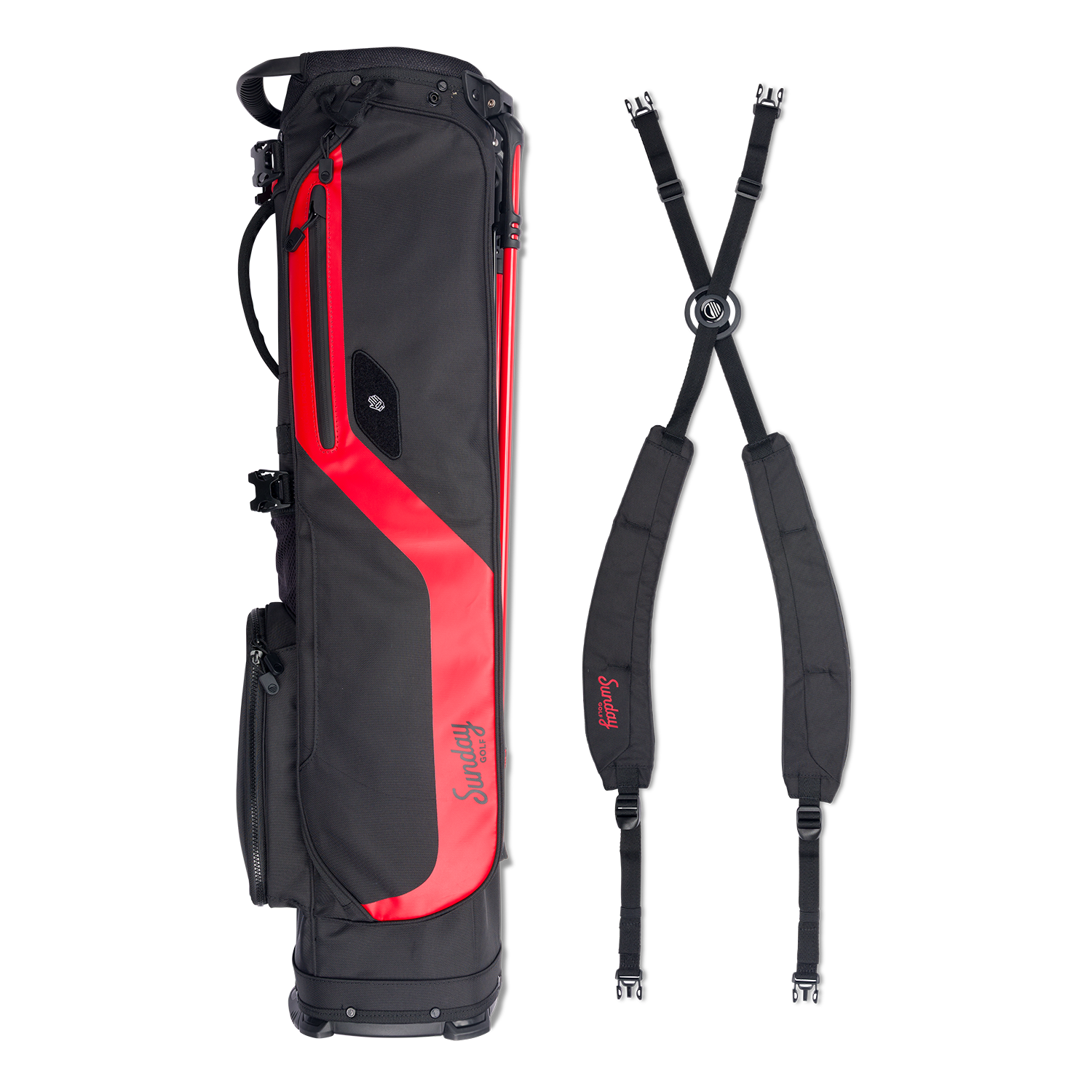 A full shot of El Camino golf bag in blackjack laying flat sideways beside its double strap 
