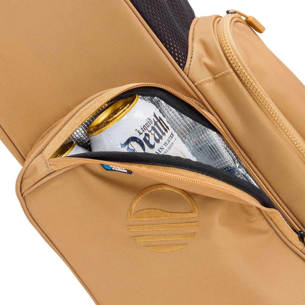 A close up shot of clay thompson El Camino golf bag's insulated pocket with a canned drink inside

