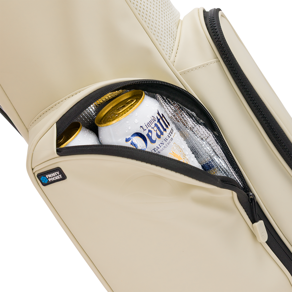 A close up shot of Cream El Camino S-class golf bag's insulated pocket with a canned drink inside
