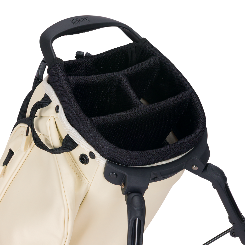 A close up top view of a Cream El Camino S-class golf bag's 4 way divider  
