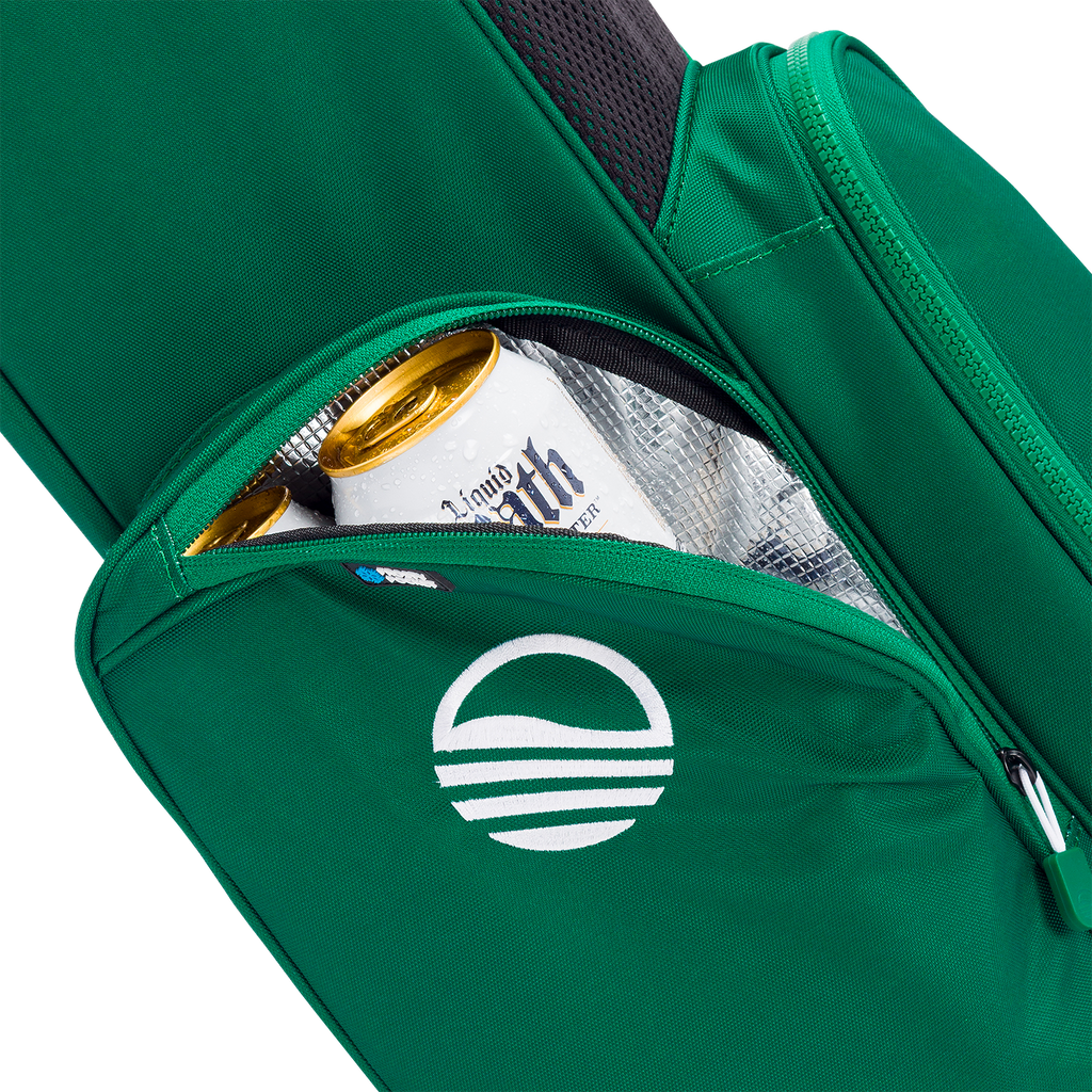 Green bag with a logo, containing a newspaper and a can, on a white background