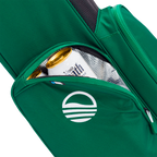 Green bag with a logo, containing a newspaper and a can, on a white background