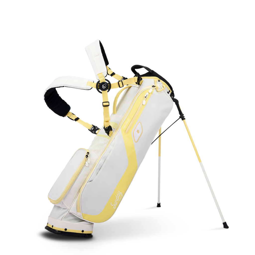 A full front shot of standing El Camino golf bag in mindy lemon with double strap