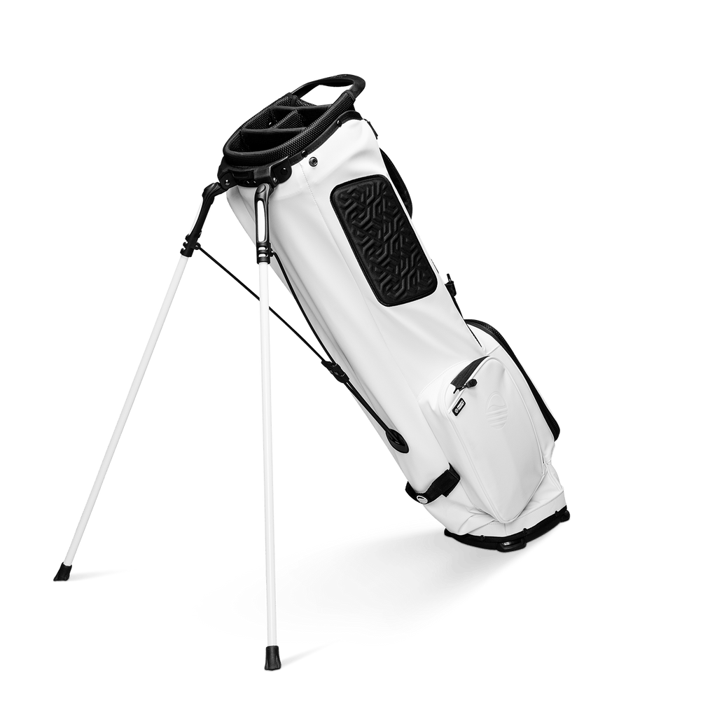 A full shot of standing El Camino S-Class golf bag in vegan white leather facing backward