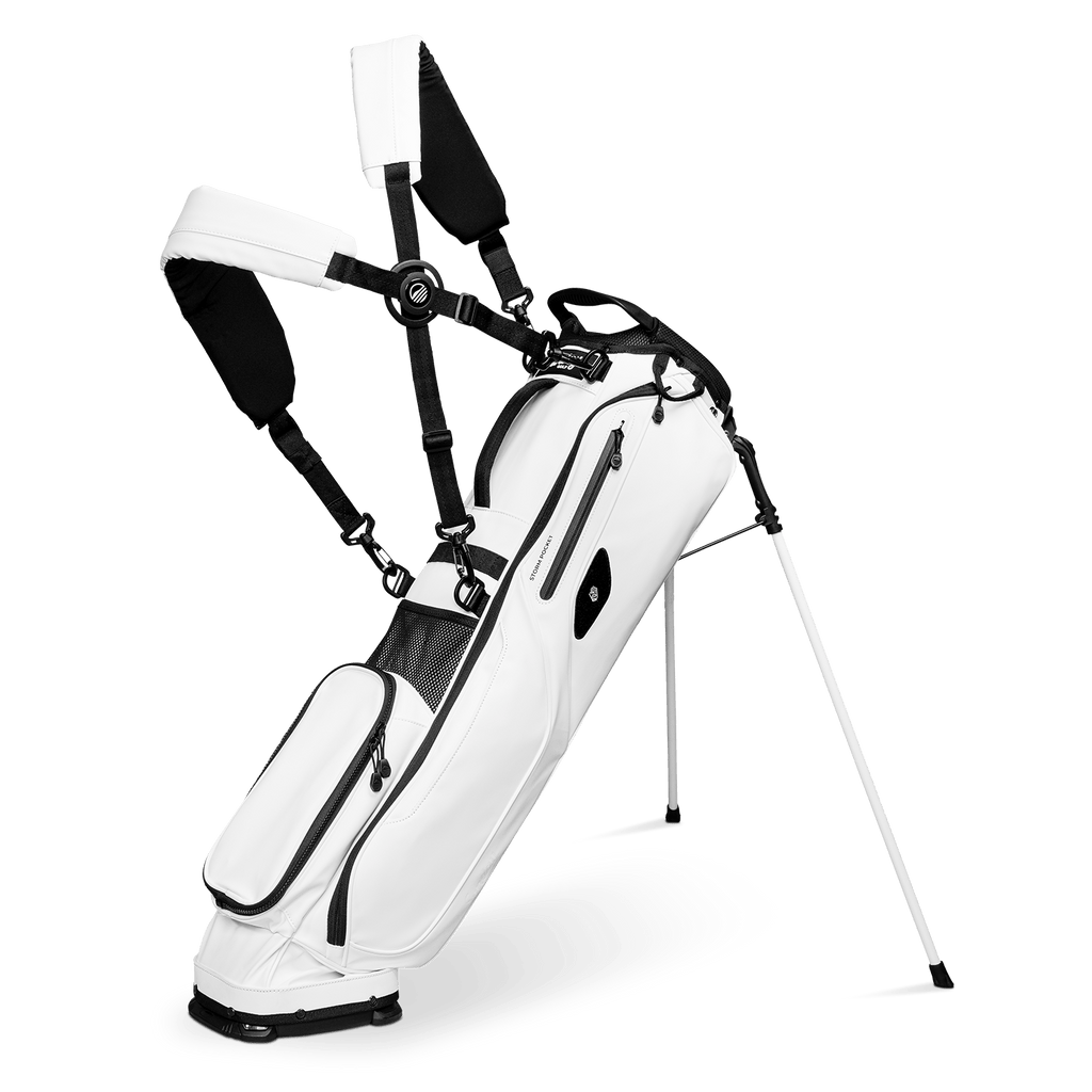 A full shot of standing El Camino S-Class golf bag in white vegan leather with floating double straps