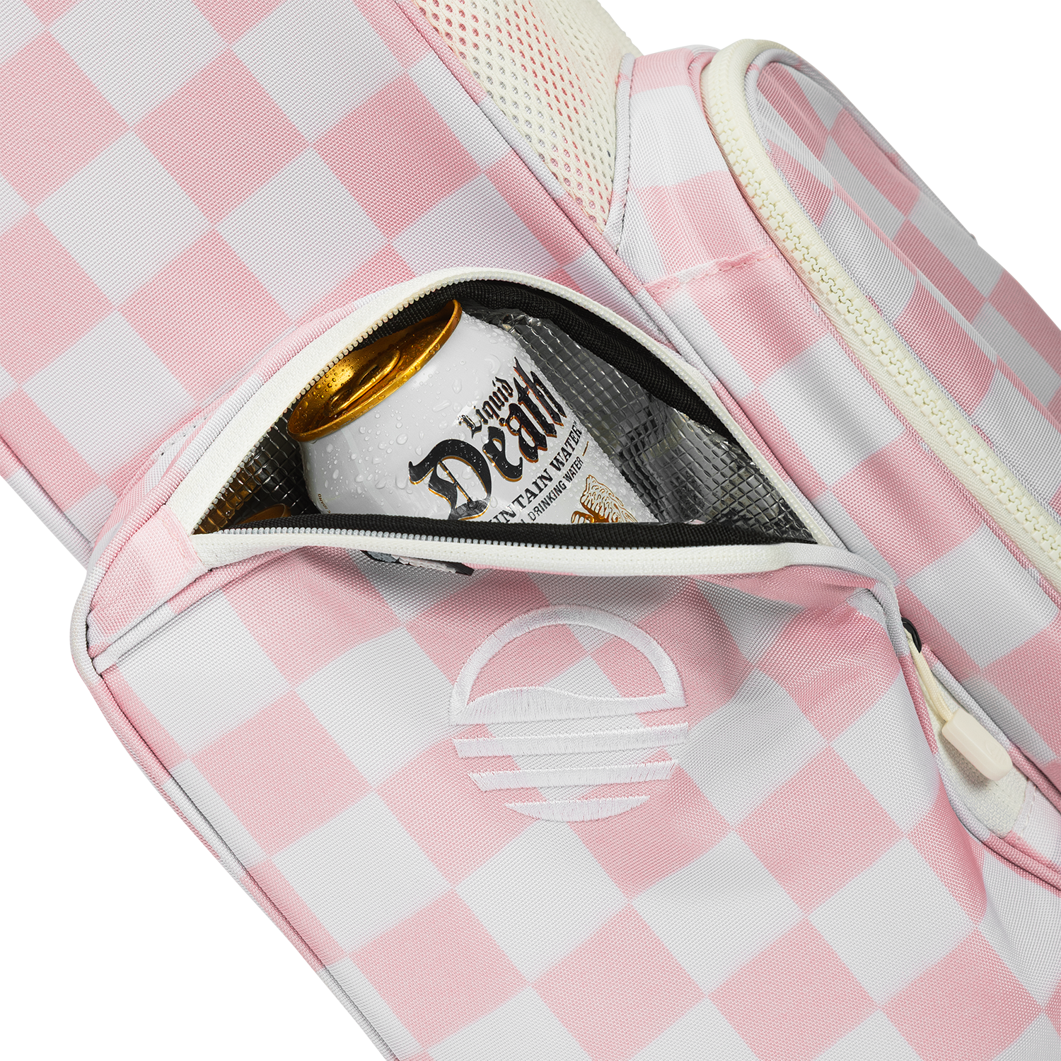 A close up shot of Pink/White Checker El Camino golf bag's insulated pocket with a canned drink inside
